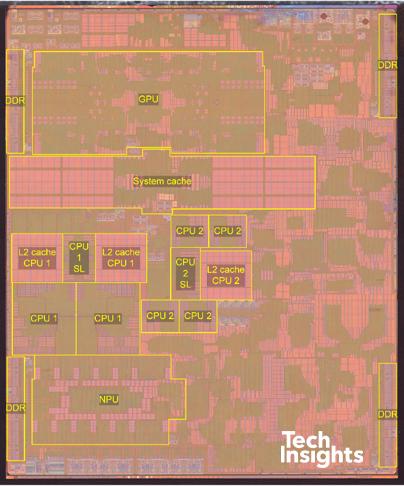 "Labeled die photograph of a system-on-chip: major regions outlined for GPU, system cache, CPU clusters with L2 caches, neural engine, and DDR memory interfaces along the die edges."